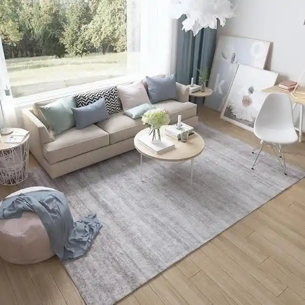 Jednobarevný světle šedý koberec Cenový Hit